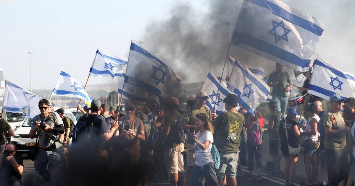 Israeli strike hits Gaza vehicle as Tel Aviv protesters demand October 7 inquiry